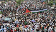 People participate in a demonstration titled 