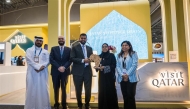 Officials and partners at the Visit Qatar pavilion at WTM Africa. 