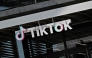 The TikTok logo is seen outside the Chinese video app compan's Los Angeles offices in Culver City, California, on April 4, 2025. Photo by Robyn Beck / AFP