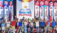 Philippines' President Ferdinand Marcos Jr (C) attends a campaign rally of senatorial candidates under his party in Mandaluyong, Metro Manila, on May 9, 2025, ahead of the midterm elections. (Photo by Jam Sta Rosa / AFP)