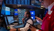 Traders work on the floor of the New York Stock Exchange (NYSE) on May 19, 2025 in New York City. (Photo by Spencer Platt/Getty Images/AFP)