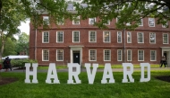 A Harvard sign is seen at the Harvard University campus in Boston, Massachusetts, on May 27, 2025. (Photo by Rick Friedman / AFP)