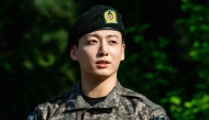 Jungkook of BTS looks on at an outdoor sporting facility in Yeoncheon on June 11, 2025, shortly after his and Jimin's release from South Korean military service. (Photo by Anthony Wallace / AFP)
 