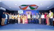 Indian Cultural Centre officials with the artists at the ceremony.