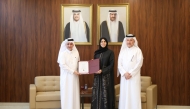 Minister of Education and Higher Education H E Lolwah bint Rashid bin Mohammed Al Khater presenting institutional accreditation to President of CCQ Dr. Khalid Mohamed Al Horr.