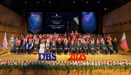 DBS officials and staff with the graduating students during the ceremony.