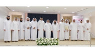 Minister of Awqaf and Islamic Affairs H E Ghanem bin Shaheen bin Ghanem Al Ghanem with honourees and officials during the event.