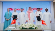 Officials from Snoonu and Jahez Group during the event.