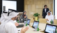Minister of Education and Higher Education H E Lolwah bint Rashid bin Mohammed Al-Khater applauds while approving the results along with other Ministry officials.