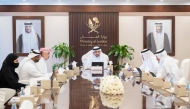 Minister of Justice and Minister of State for Cabinet Affairs H E Ibrahim bin Ali bin Issa Al Hassan Al Mohannadi with new attorneys.