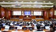 This handout photo taken and released by the Cambodia National Assembly on July 11, 2025 shows members of parliament attending a meeting at the National Assembly building in Phnom Penh. (Photo by Handout / CAMBODIA NATIONAL ASSEMBLY / AFP)