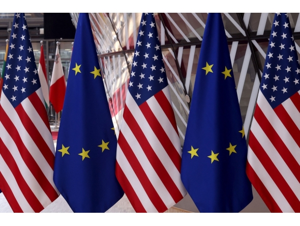 This picture shows flags prior to an EU - US summit at the European Union headquarters in Brussels on June 15, 2021. Photo by Kenzo Tribouillard / AFP