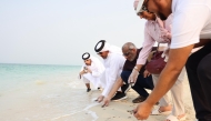 Ambassador of South Africa to Qatar H E Ghulam Hoosein Asmal with other officials at the event.