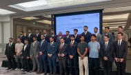 Officials and graduating students during the ceremony. 