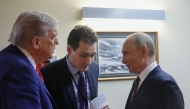 In this pool photograph distributed by the Russian state agency Sputnik, US President Donald Trump (L) and Russian President Vladimir Putin (R) chat before holding a joint press conference following a US-Russia summit on Ukraine at Joint Base Elmendorf-Richardson in Anchorage, Alaska, on August 15, 2025. (Photo by Gavriil Grigorov / POOL / AFP)