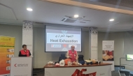 Trainers in action during the awareness lecture.