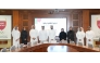 SOP Organizing Committee Chairman Sheikh Khalifa bin Khalid Al Thani poses for a photo with officials.
