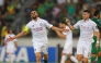 Qatar's Hassan Al Haydos celebrates after scoring the equaliser.