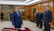 File photo: Newly appointed Spain's Economy Minister Carlos Cuerpo swears on the constitution in front of Spain's King Felipe VI during a ceremony at la Zarzuela Palace in Madrid, on December 29, 2023. (Photo by Andres Ballesteros / POOL / AFP)

