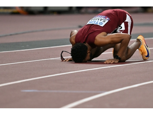 Qatar's athlete Abderrahman Samba reacts after competing in the men's 400m hurdles final during the World Athletics Championships in Tokyo on September 19, 2025. (Photo by Andrej ISAKOVIC / AFP)
