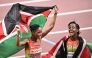 Kenya's Beatrice Chebet and Kenya's athlete Faith Kipyegon (R) celebrate after the women's 5000m final during the World Athletics Championships in Tokyo on September 20, 2025. (Photo by Philip Fong / AFP)