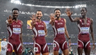 From left: Qatar's Yahya Ibrahim, Bassem Hemeida, Abderrahman Samba and Ismail Dawood react after finishing fifth in the 4x400 metres final at the World Athletics Championships in Tokyo yesterday. 