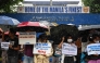Youth groups stage a protest in front of the Manila Police District Headquarters to demand the release of arrested individuals a day after an anti-corruption rally in Manila on September 22, 2025. (Photo by Jam Sta Rosa / AFP)
 