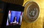 Palestinian Authority President Mahmud Abbas is displayed on a screen as he speaks remotely during a United Nations Summit on Palestinians at UN headquarters during the United Nations General Assembly (UNGA) in New York on September 22, 2025. (Photo by Angela Weiss / AFP)
