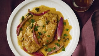 Orange Chicken Piccata With Shallots. Picture: Marvin Joseph/The Washington Post; food styling by Lisa Cherkasky