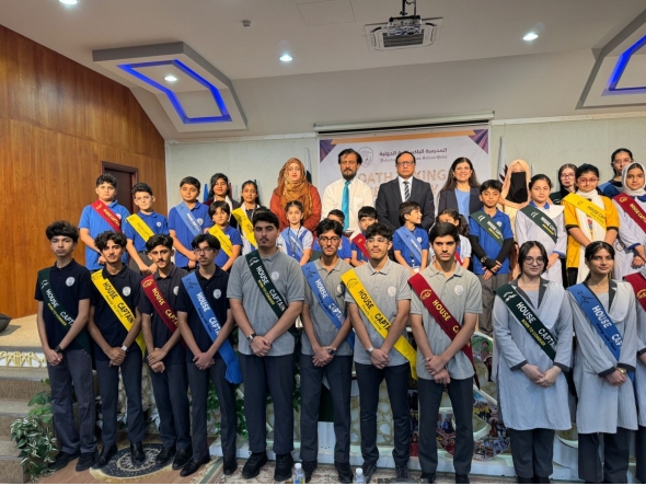 PISQ Principal Ch Muhammad Afzal with other officials and students during the event.