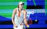 Kazakhstan's Elena Rybakina serves to Russia's Ekaterina Alexandrova during the women's singles final at the WTA Ningbo Open tennis tournament in Ningbo, China on October 19, 2025. (Photo by AFP)