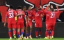 Paris Saint-Germain (PSG) players celebrate win against Bayer 04 Leverkusen at the UEFA Champions League at the BayArena stadium in Leverkusen, western Germany on October 21, 2025. (Photo by Franck Fife / AFP)