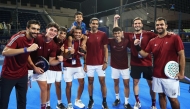 Qatar players and officials celebrate after qualifying for the final.