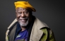 American singer, songwriter, and painter George Edward Clinton, poses during an exhibition of his paintings at the Galerie Mariane Ibrahim in Paris on October 23, 2025. (Photo by Joel Saget / AFP)