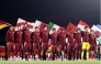 Qatar players before the start of the match against Italy on Monday.