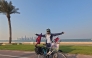 Nepali cyclist Niranjan Aryal with his cycle at Doha Corniche.