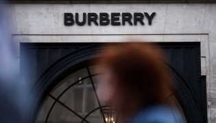 Pedestrians walk past the store of British fashion label Burberry in central London on September 2, 2024. Photo by HENRY NICHOLLS / AFP