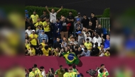 Brazil players celebrate after winning the match. PIC: CBF