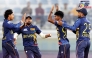 Sri Lanka captain Dunith Wellalage (left) celebrates with teammates.