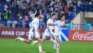 Palestine players celebrate after defeating Libya in a penalty shootout at Thani bin Jassim Stadium yesterday. PIC: PFA
