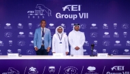 Event Director Khalid Al-Hitmi poses for a photo along with other officials. 