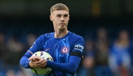 File photo: Chelsea's English midfielder #20 Cole Palmer walks off with the match ball having score all four goals in the English Premier League football match between Chelsea and Brighton and Hove Albion at Stamford Bridge in London on September 28, 2024. Photo by Glyn KIRK / AFP.

