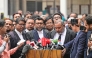 prosecutor for the Anti-Corruption Commission Khan Mainul Hasan (C), addresses the media at a court premises in Dhaka on December 1, 2025. (Photo by Munir Uz Zaman / AFP)