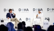 Prime Minister and Minister of Foreign Affairs H E Sheikh Mohammed bin Abdulrahman bin Jassim Al-Thani in discussion with Tucker Carlson at the Doha Forum yesterday.