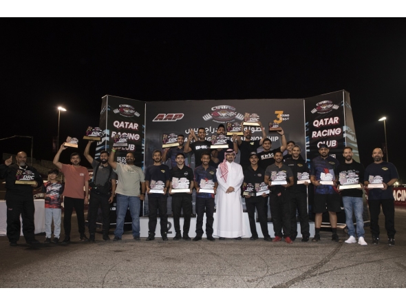 QRC Director General Sheikh Jabor bin Khalid Al Thani poses for a photo with the podium winners.