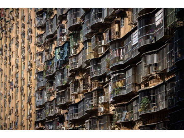 The Hou Kong residential building is seen in Macau on December 8, 2025. Macau's population is estimated around 710,000 across roughly 33 square kilometres, making it the world's most densely populated region. (Photo by Eduardo Leal / AFP)