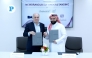 Minister of Economic Development for the City of Buenos Aires H E Hernán Lombardi with Chief Executive Officer of QFC Yousuf Mohamed Al-Jaida during signing ceremony. Pic: Rajan Vadakkemuriyil / The Peninsula
