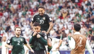 UAE's Bruno Oliveira (second left) celebrates his 64th minute equaliser with teammates. PIC: UAEFA