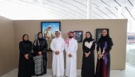 Minister of State and President of Qatar National Library H E Dr. Hamad bin Abdulaziz Al Kawari with artists and Library officials. 