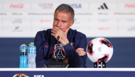PSG coach Luis Enrique looks on during a press conference yesterday.